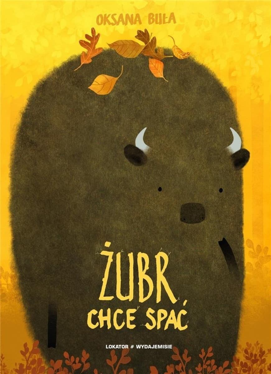 Żubr szuka miejsca do spania
